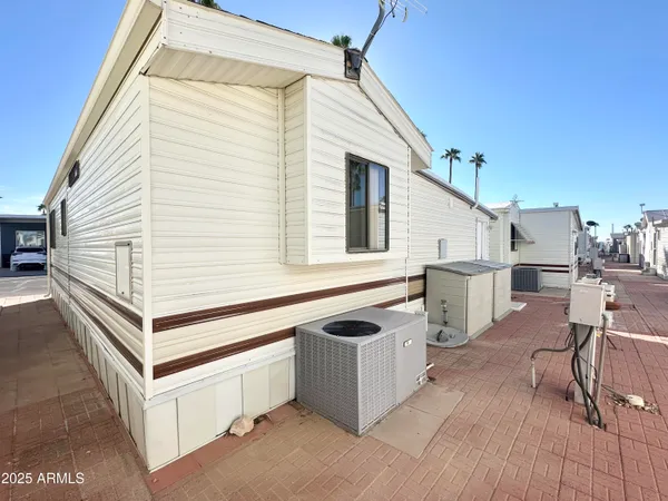a view of swimming pool with outdoor seating