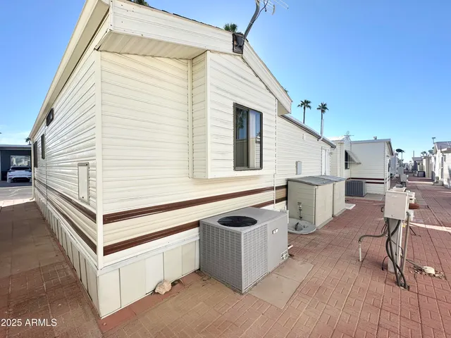a view of swimming pool with outdoor seating