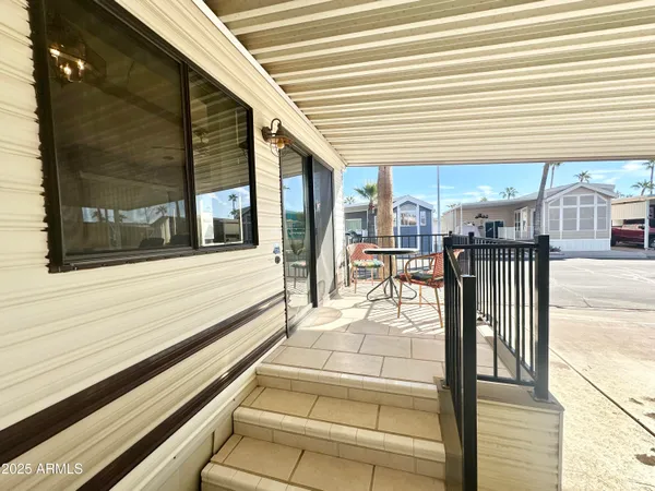 a view of a building with sitting area