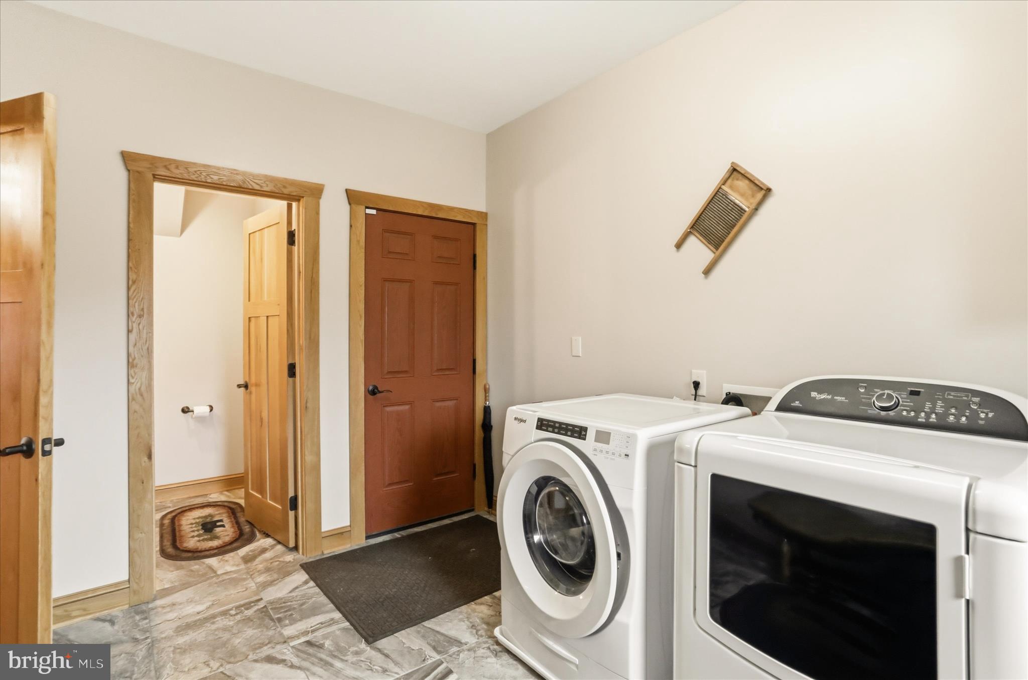 879 Olde Oak View Drive Springfield, WV 26763 - Photo 32 of 70 a utility room with dryer and washer
