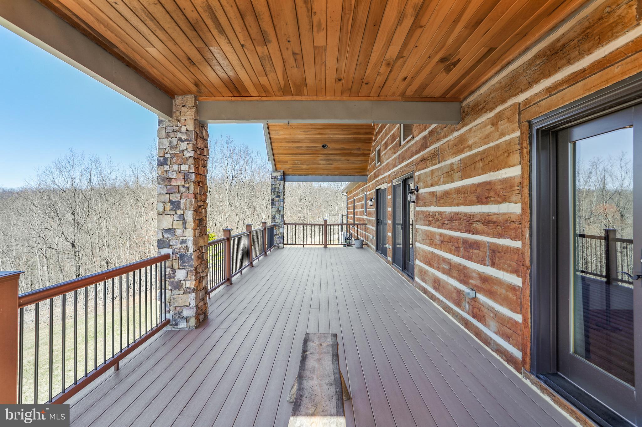 879 Olde Oak View Drive Springfield, WV 26763 - Photo 44 of 70 a view of a balcony with wooden floor