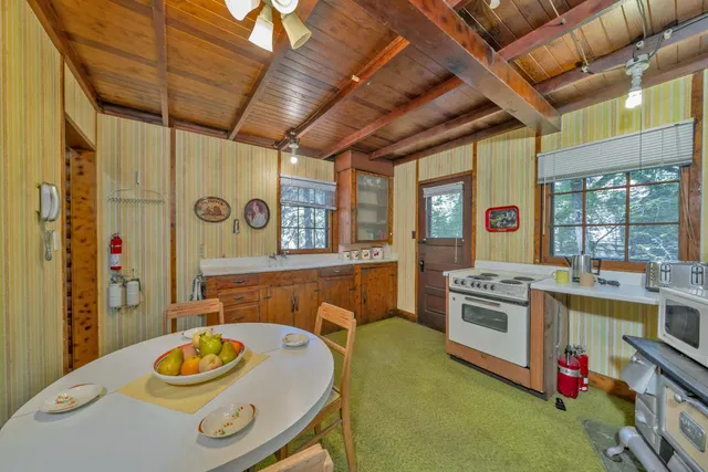 a room with furniture and a chandelier