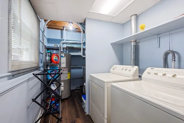a view of storage and utility room with washer and dryer