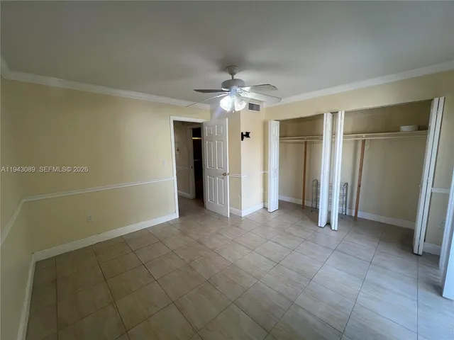 a kitchen that has a sink and a window