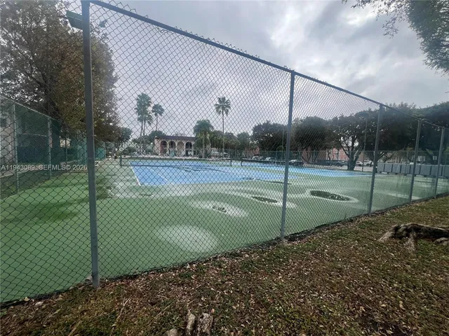 a view of a swimming pool with a sitting space