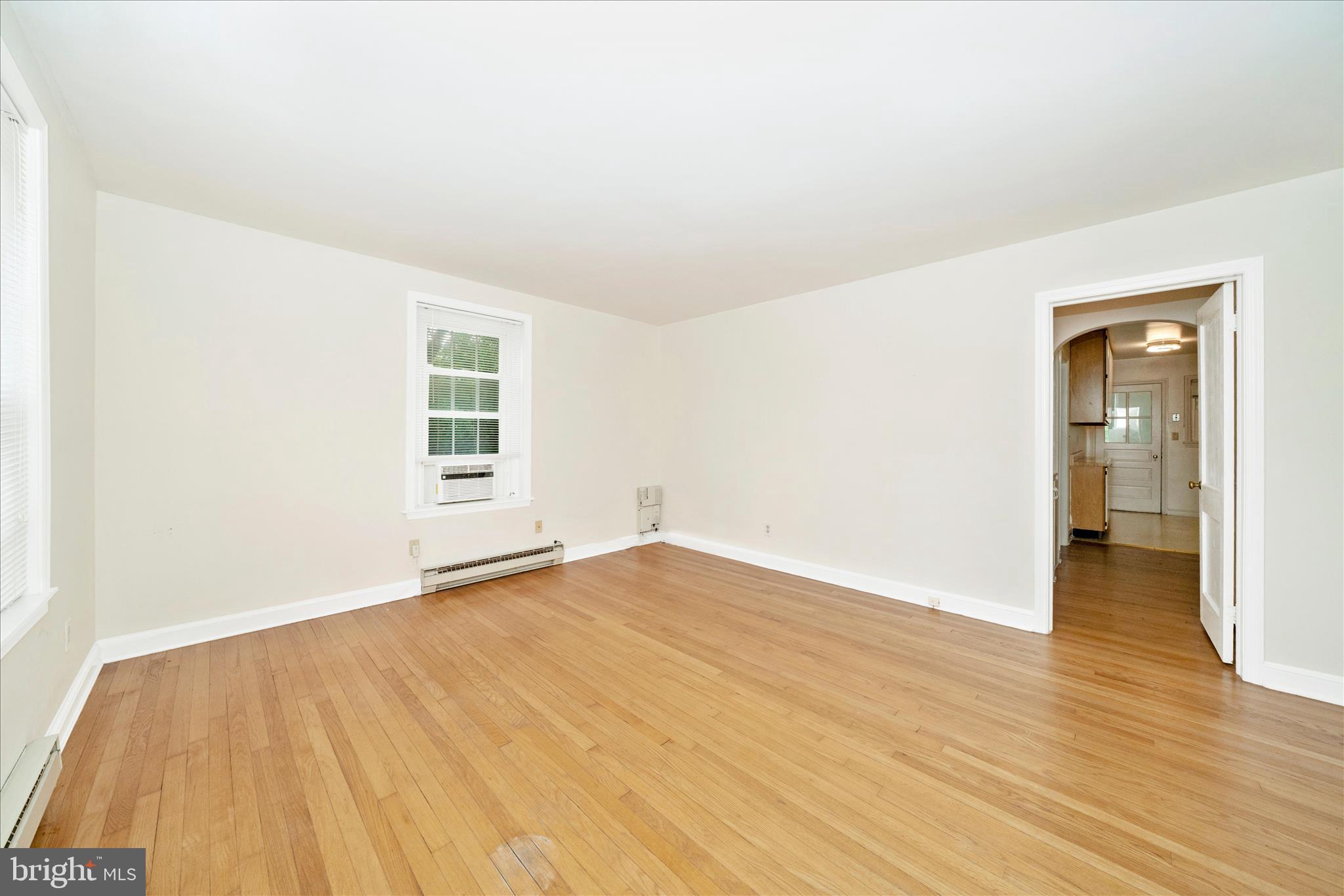 25930 Ridge Road Damascus, MD 20872 - Photo 7 of 62 Unit 1 Living Room - Hardwood Throughout