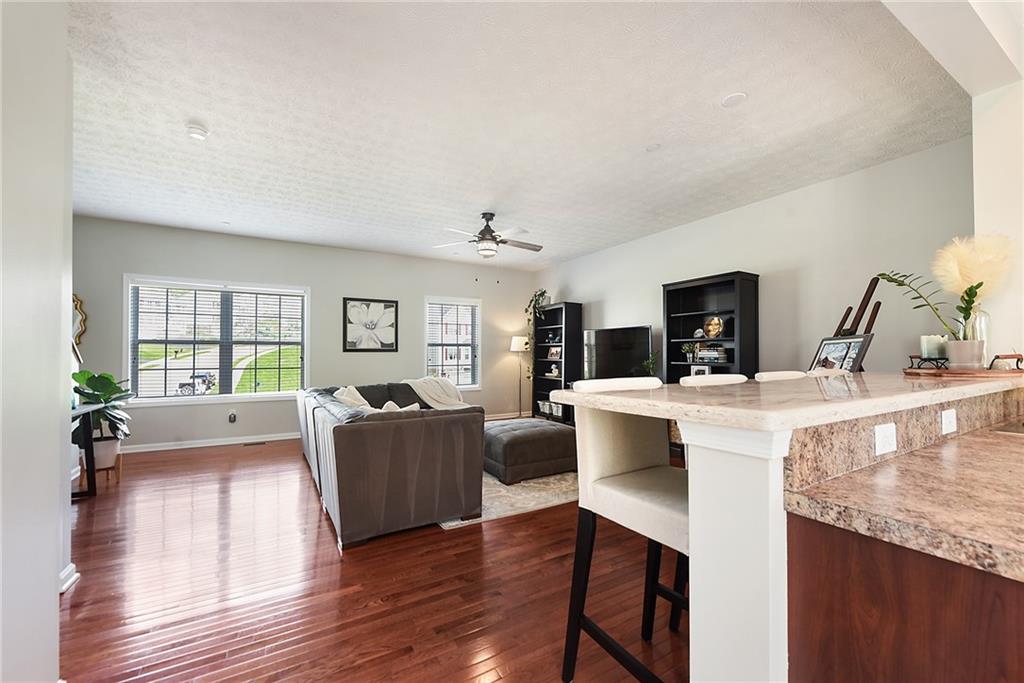 703 Freedom Drive Pittsburgh, PA 15205 - Photo 16 of 42 a living room with fireplace furniture and a table
