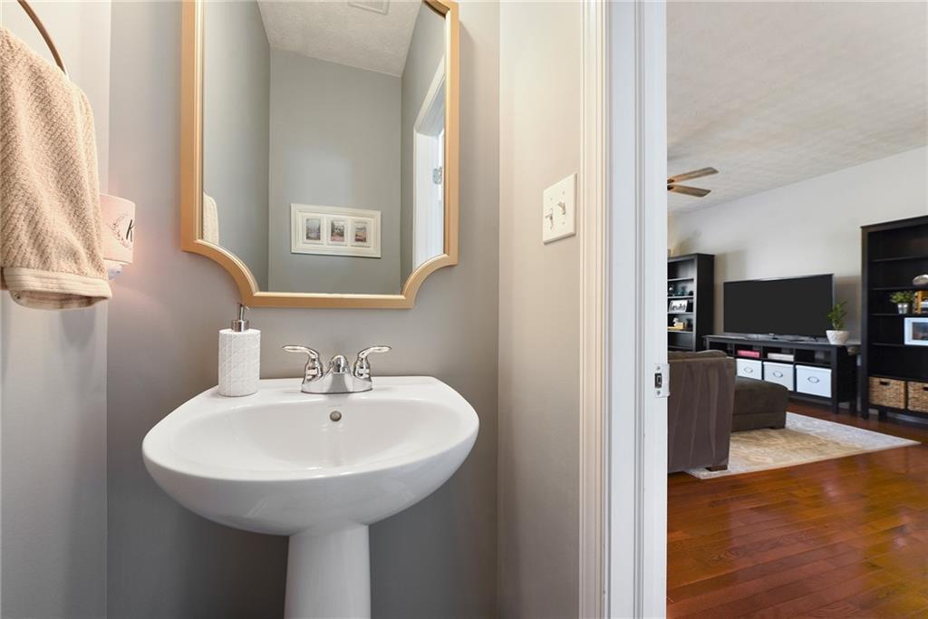 703 Freedom Drive Pittsburgh, PA 15205 - Photo 18 of 42 a bathroom with a sink and a mirror