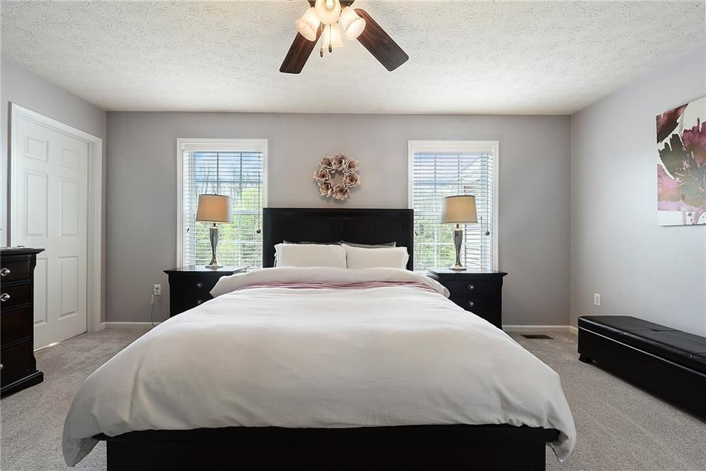 703 Freedom Drive Pittsburgh, PA 15205 - Photo 20 of 42 a bedroom with a bed and wooden floor