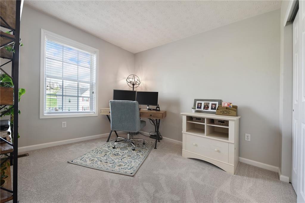 703 Freedom Drive Pittsburgh, PA 15205 - Photo 28 of 42 a view of a workspace with furniture and a window