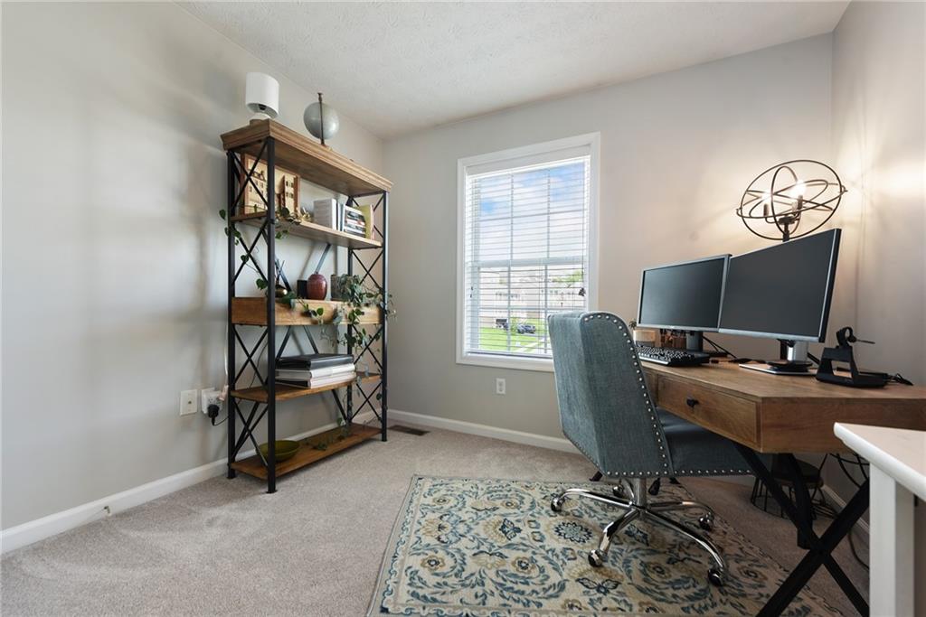 703 Freedom Drive Pittsburgh, PA 15205 - Photo 29 of 42 a view of a workspace with furniture and a window