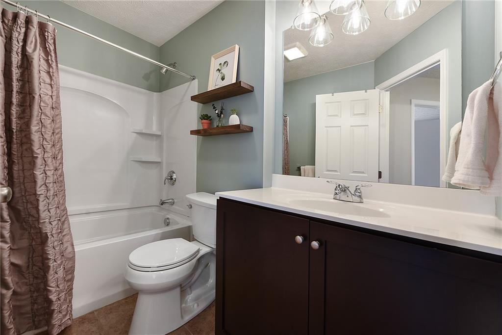 703 Freedom Drive Pittsburgh, PA 15205 - Photo 30 of 42 a bathroom with a sink a toilet and shower