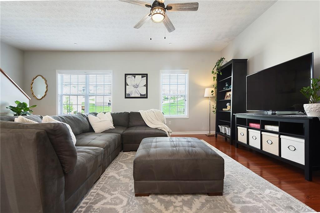 703 Freedom Drive Pittsburgh, PA 15205 - Photo 3 of 42 a living room with furniture and a flat screen tv