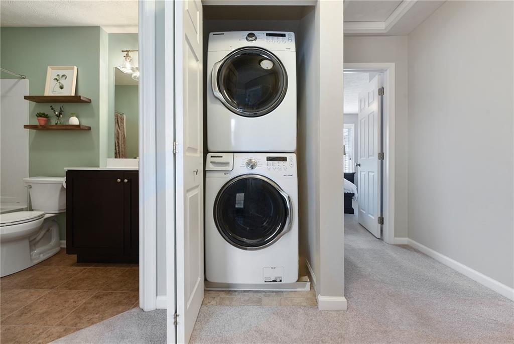 703 Freedom Drive Pittsburgh, PA 15205 - Photo 31 of 42 a view of a hallway with washer and dryer
