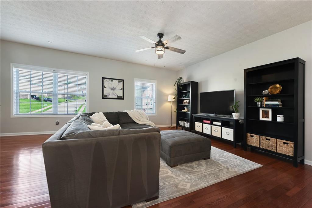 703 Freedom Drive Pittsburgh, PA 15205 - Photo 4 of 42 a living room with furniture and a flat screen tv
