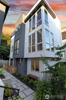 a front view of a building with garden