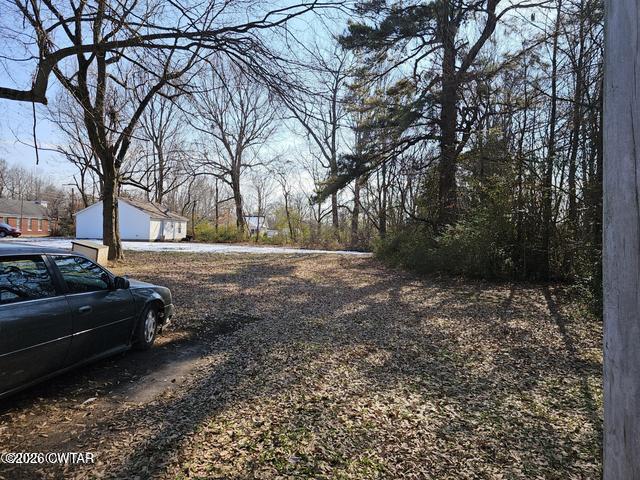 110 Birch Street Jackson, TN 38301 - Photo 2 of 3 a view of a yard with a house