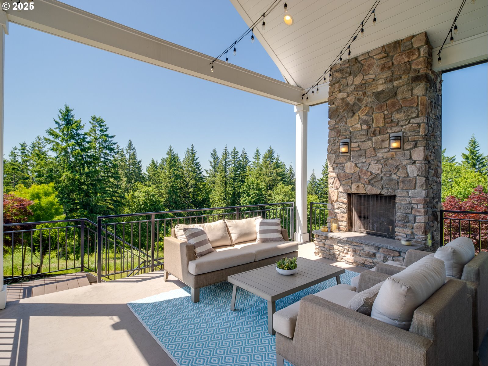 13848 Southeast Diamond Rdg Road Happy Valley, OR 97086 - Photo 14 of 48 a balcony with furniture and a potted plant