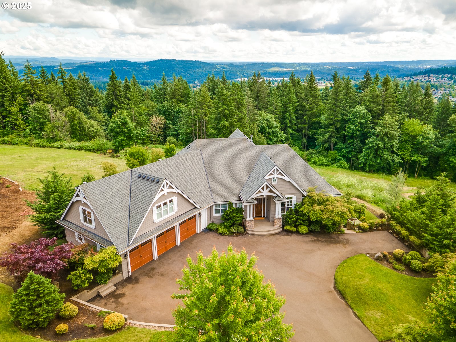 13848 Southeast Diamond Rdg Road Happy Valley, OR 97086 - Photo 2 of 48 an aerial view of a house with swimming pool and garden