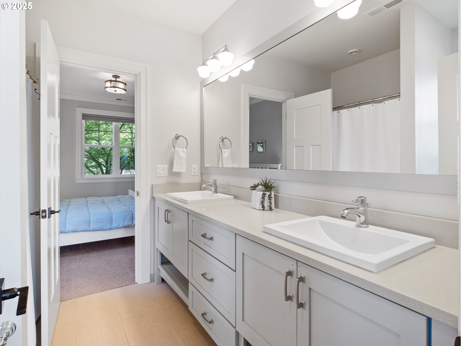 13848 Southeast Diamond Rdg Road Happy Valley, OR 97086 - Photo 23 of 48 a en suite bathroom with a double vanity sink and a mirror