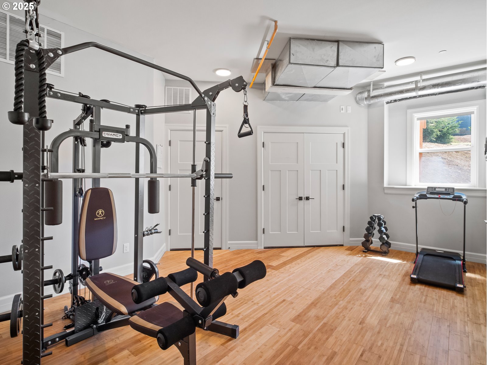 13848 Southeast Diamond Rdg Road Happy Valley, OR 97086 - Photo 31 of 48 a room with gym equipment