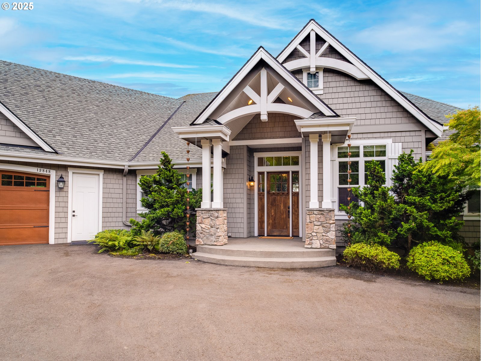 13848 Southeast Diamond Rdg Road Happy Valley, OR 97086 - Photo 4 of 48 a front view of a house with garden