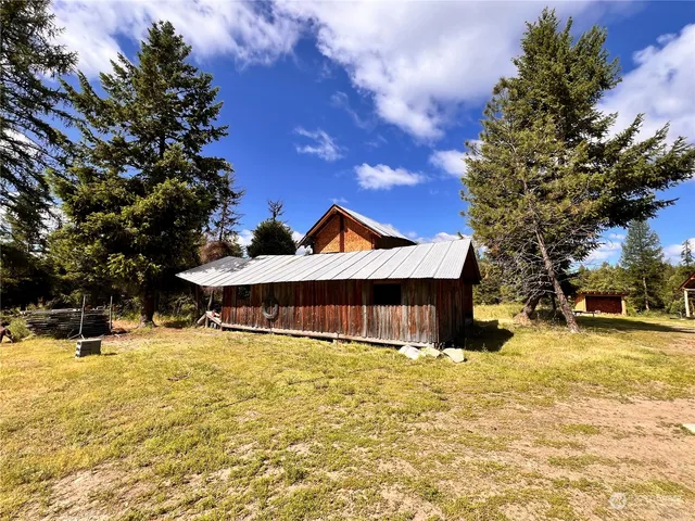 a view of a house with snow on the roof