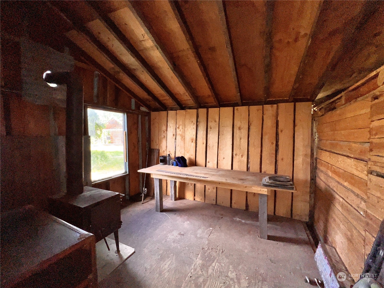 177 1st Creek Road Danville, WA 99121 - Photo 15 of 29 a view of a room with furniture and windows