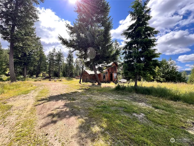 a view of swimming pool with a yard