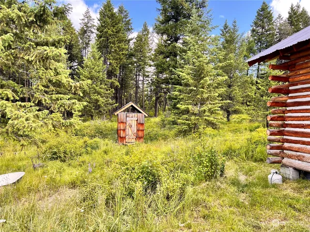 a view of a back yard of the house