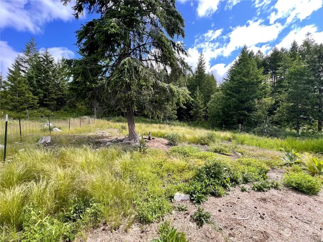 a view of a lake with a house