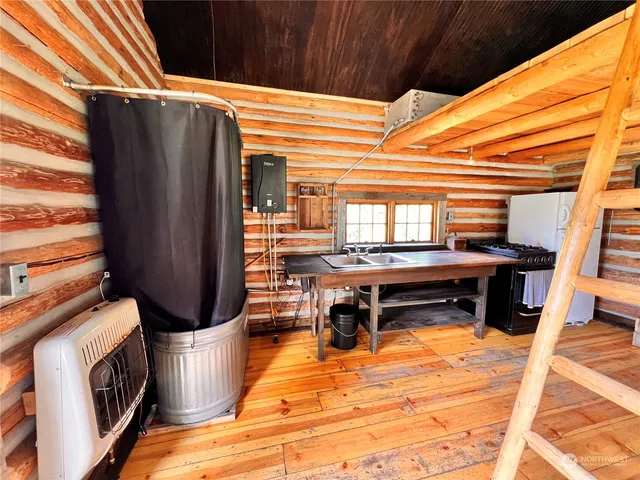 a view of a chairs and table in the patio