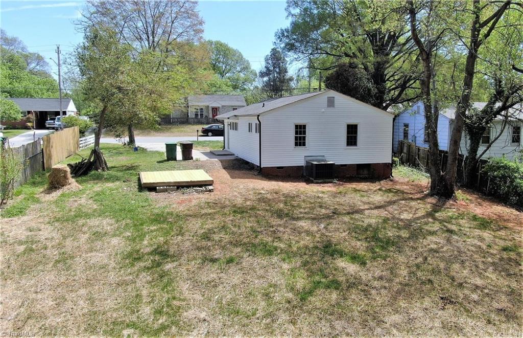 1505 Cook Street High Point, NC 27262 - Photo 4 of 22 Backyard showing wooden platform for entertaining