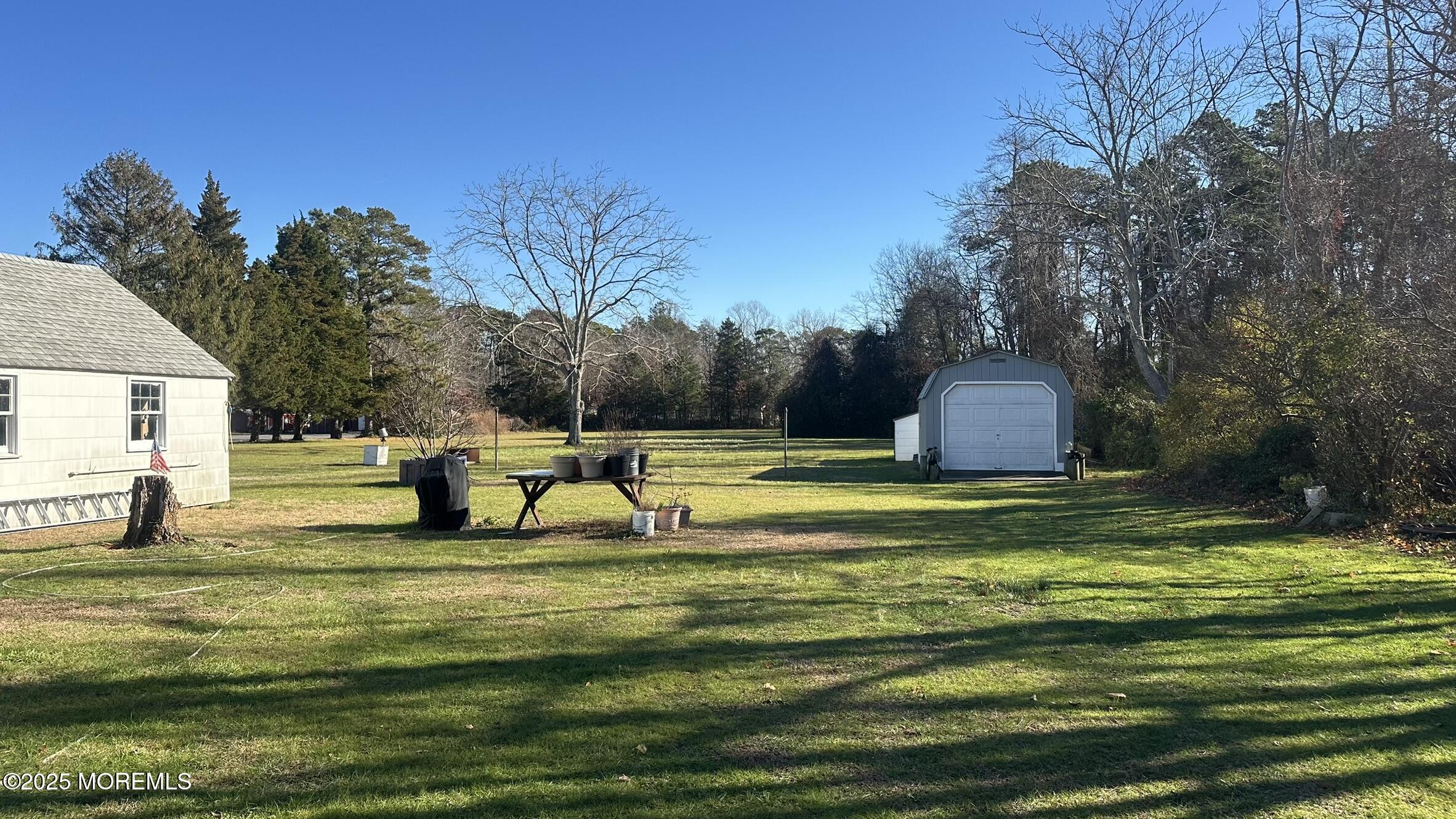 295 North Main Street Manahawkin, NJ 08050 - Photo 4 of 16 a garden view with a fountain