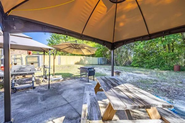 a view of outdoor space yard deck patio and outdoor kitchen