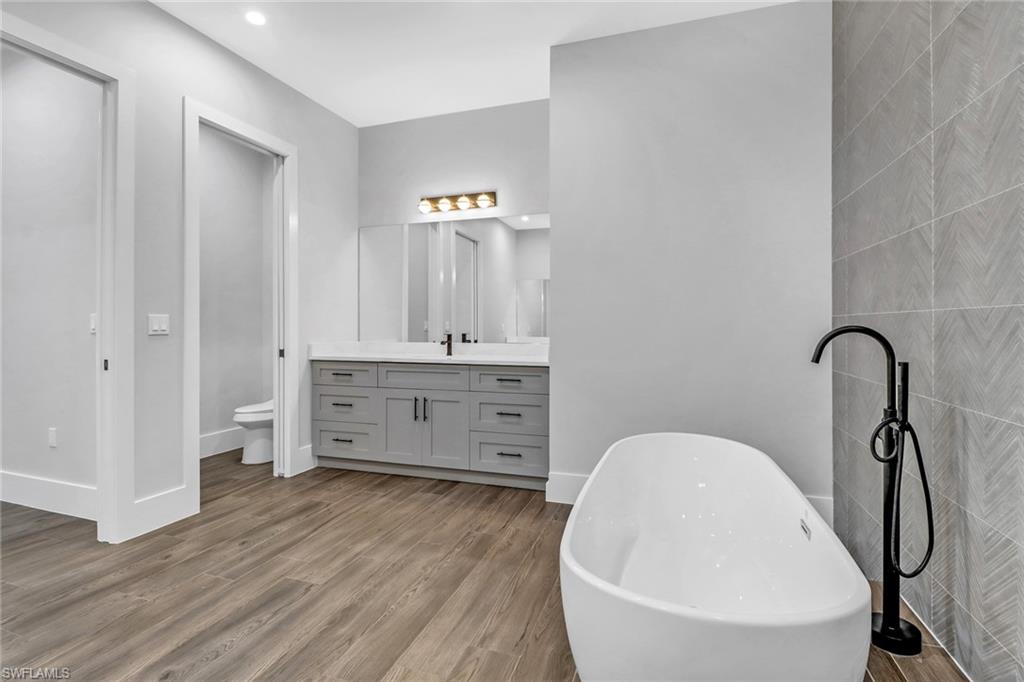 733 15th Street Southwest Naples, FL 34117 - Photo 20 of 34 a view of a hallway with seating area