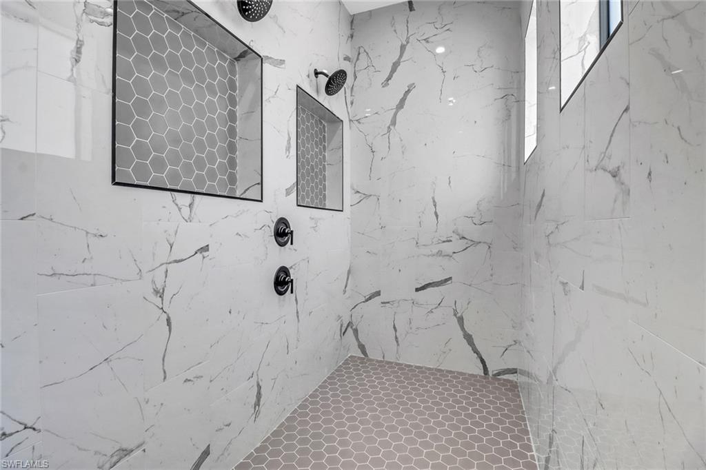 733 15th Street Southwest Naples, FL 34117 - Photo 21 of 34 a bathroom with a shower