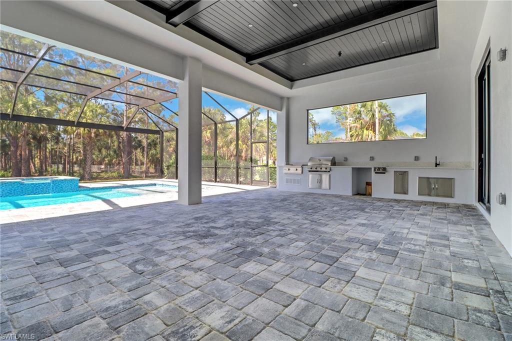 733 15th Street Southwest Naples, FL 34117 - Photo 31 of 34 a view of empty room with a large window