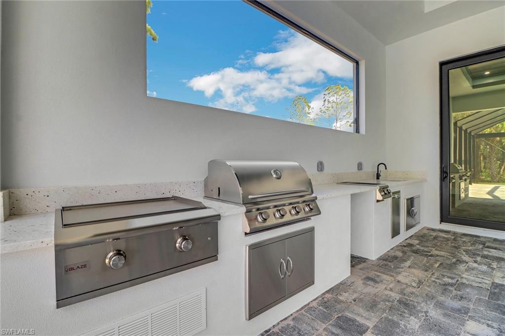 733 15th Street Southwest Naples, FL 34117 - Photo 32 of 34 a view of washer and dryer