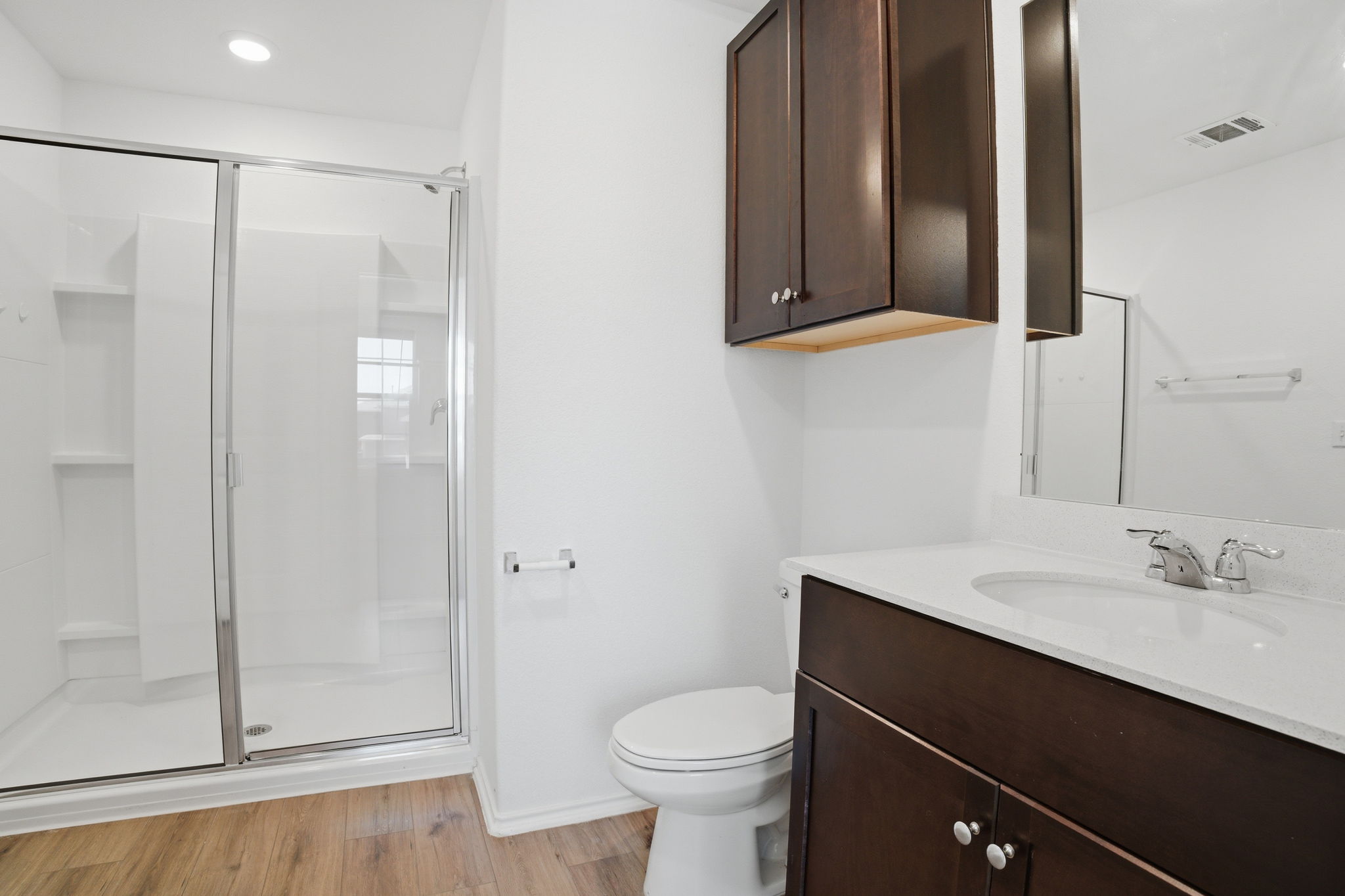 12213 Rising Moon Lane Del Valle, TX 78617 - Photo 8 of 19 a bathroom with a sink a toilet and shower