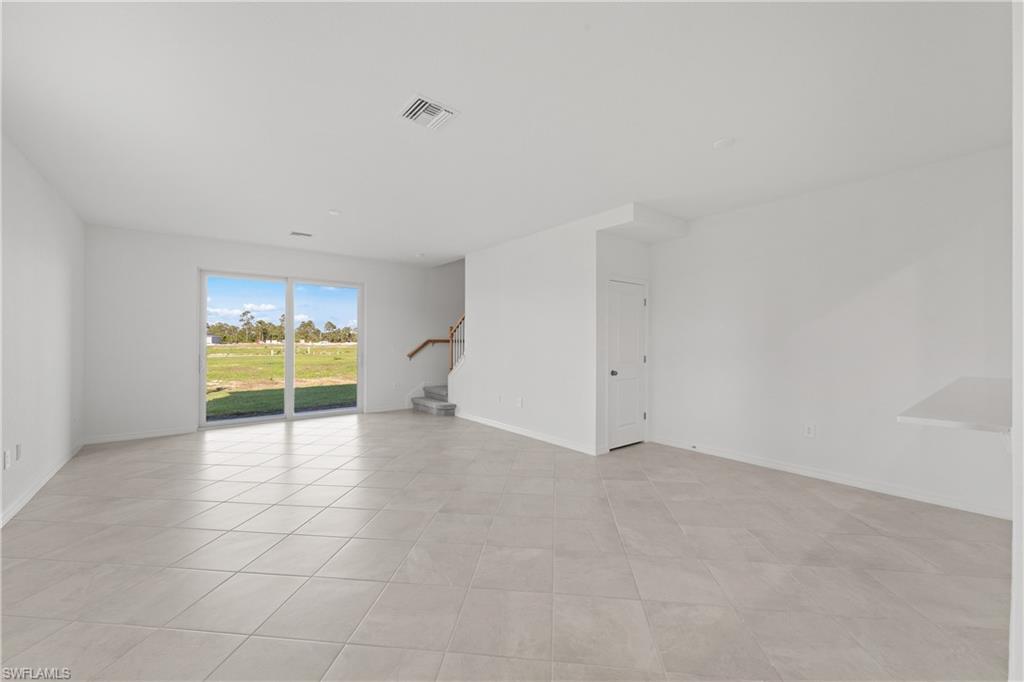 14792 Bluewater Road Babcock Ranch, FL 33982 - Photo 22 of 42 a view of an empty room with a window