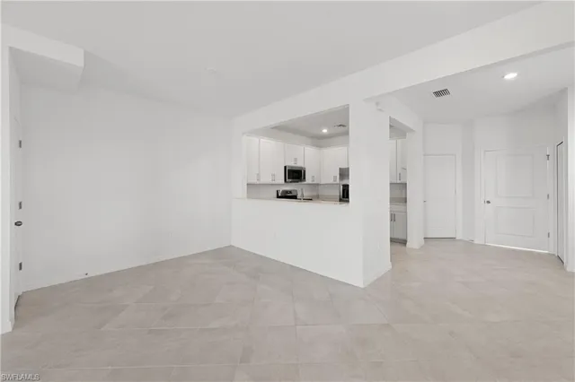 a view of a kitchen with a sink