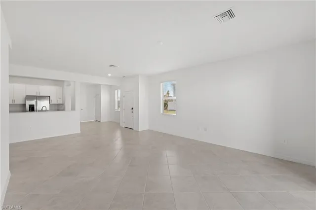 a view of an empty room with window