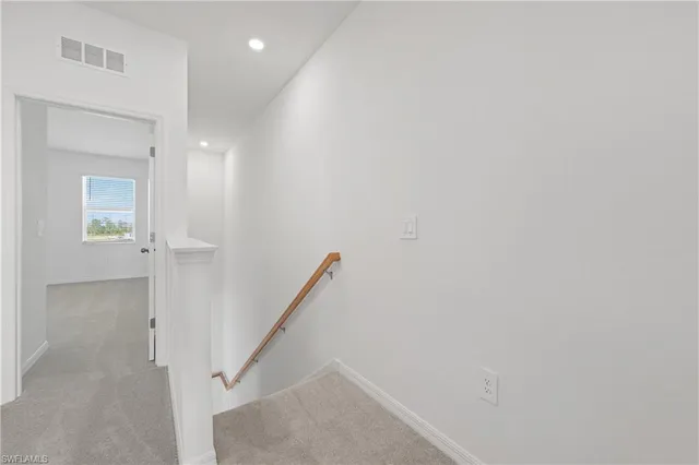 a view of a hallway with entryway