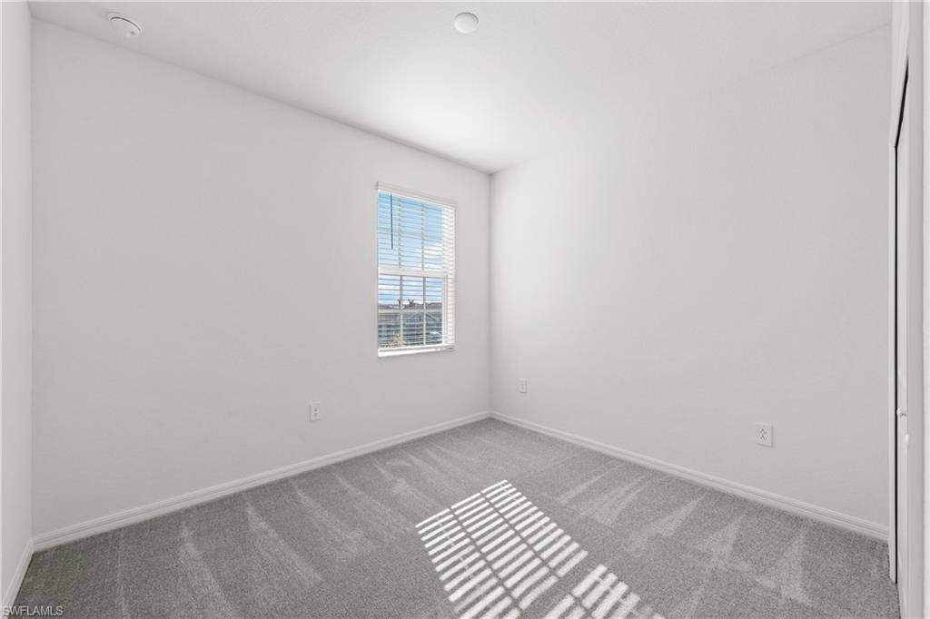 14792 Bluewater Road Babcock Ranch, FL 33982 - Photo 34 of 42 a view of an empty room and window