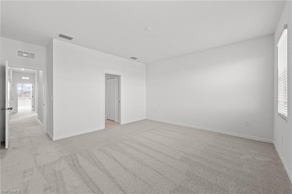 14792 Bluewater Road Babcock Ranch, FL 33982 - Photo 39 of 42 a view of an empty room