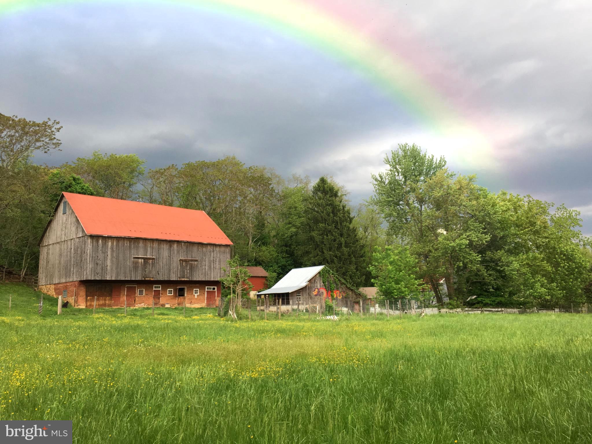 16756 Mount Airy Road Shrewsbury, PA 17361 - Photo 1 of 93 Charming barn under a vibrant rainbow.
