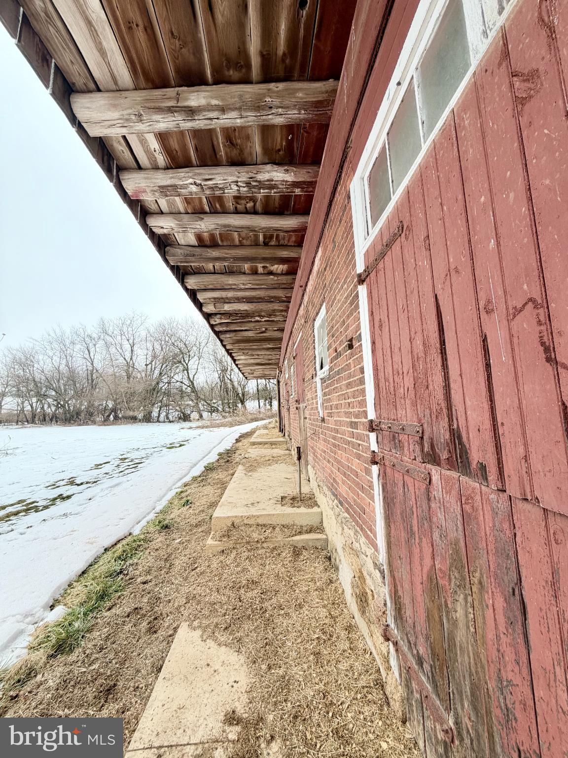 16756 Mount Airy Road Shrewsbury, PA 17361 - Photo 11 of 93 Rustic charm along a weathered barn path.