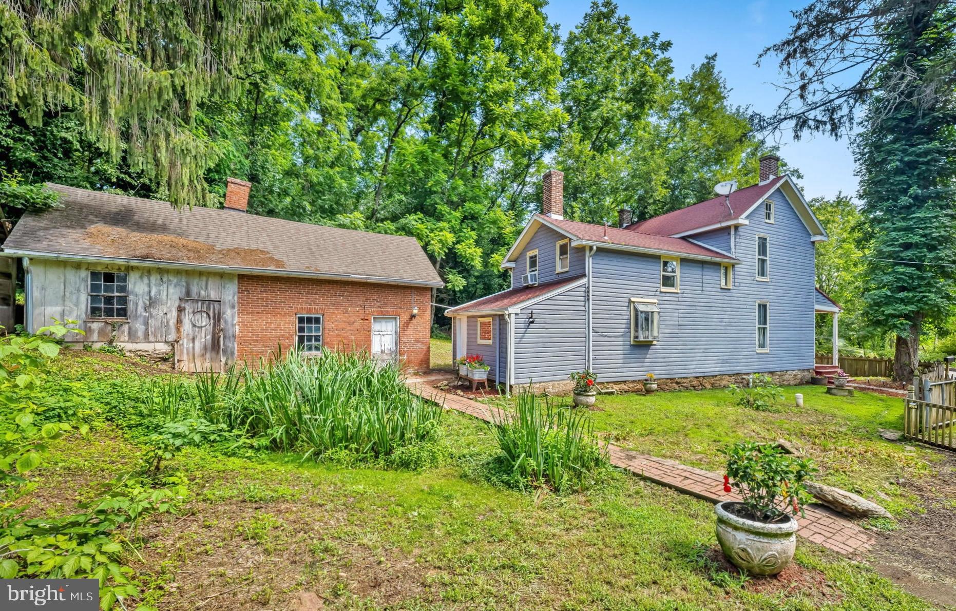 16756 Mount Airy Road Shrewsbury, PA 17361 - Photo 31 of 93 Charming dual-homed retreat in lush greenery.