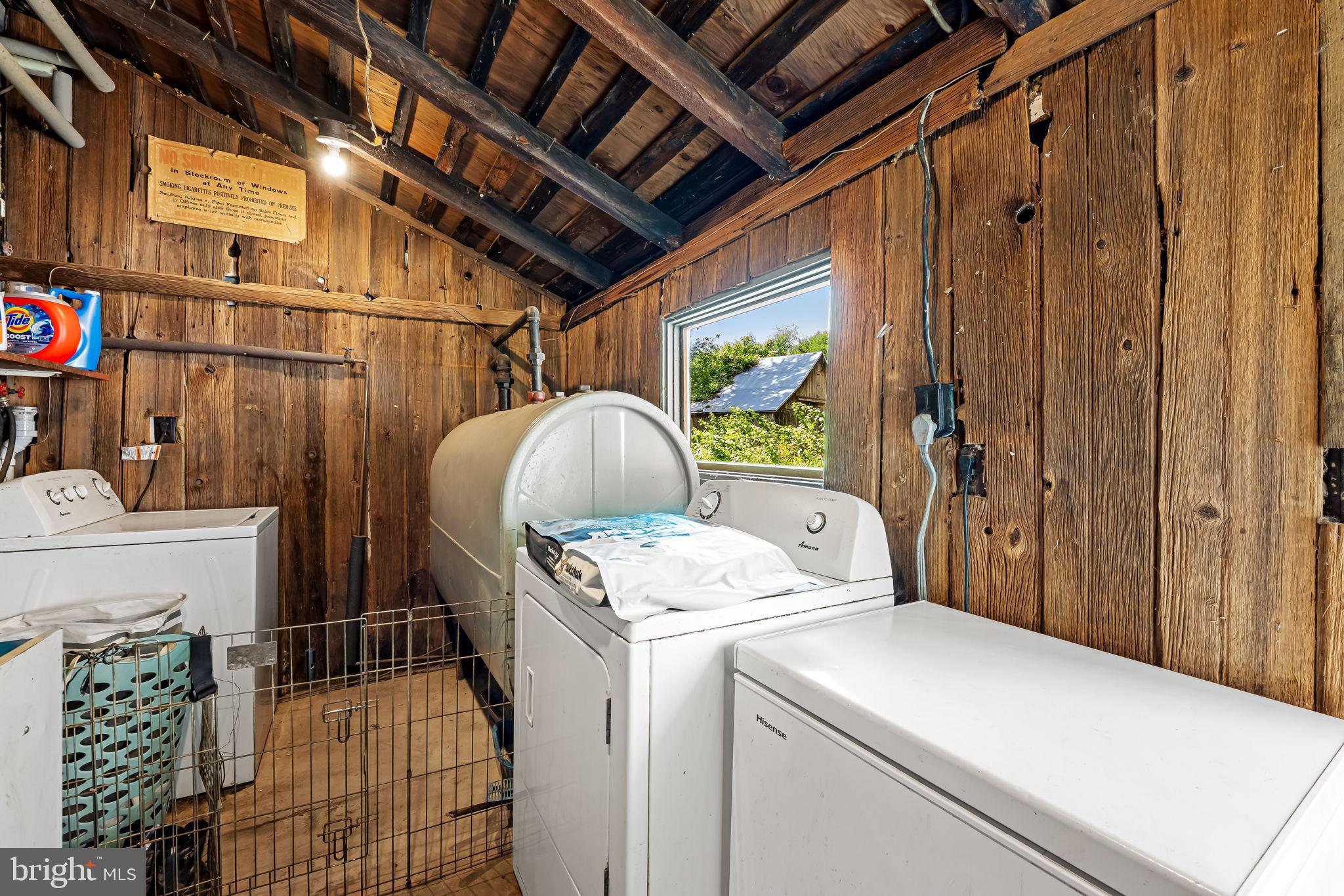 16756 Mount Airy Road Shrewsbury, PA 17361 - Photo 84 of 93 Mudroom with laundry space with wooden charm.